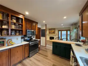 Featuring open shelving, the kitchen offers convenient and stylish storage for all your pantry essentials.