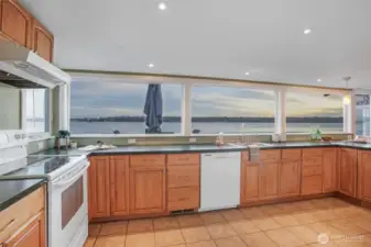 Open kitchen and dining room allows for easy entertaining.