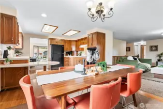 Dining open to kitchen & family room