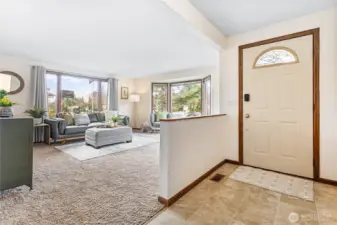 Sunny & bright living room just off main entry
