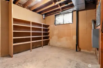 Large mechanical room w/tons of built-in storage (about double size of view in pic)
