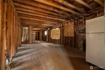 Front Entry into Family Room. Fridge Conveys.