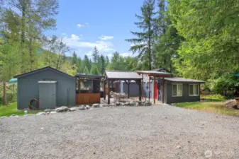3 Cabins in Ashford's beautiful Paradise Estates. Big Creek River frontage on the back of the property, and even private lake access in the community.