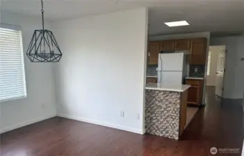 Separate dining room area between kitchen and master bedroom