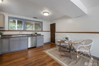 Full Kitchen in Daylight Basement Door to Garage