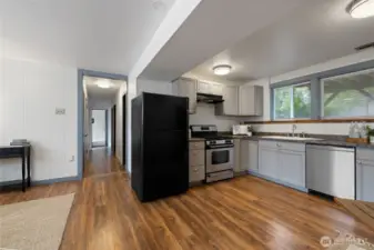 Hallway leading to 3 Full Bedrooms