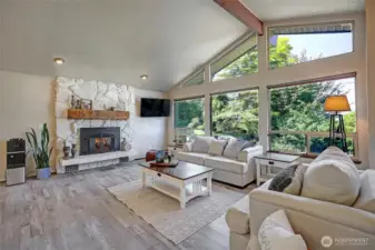Floor to ceiling windows in your beautifully updated Living Room.