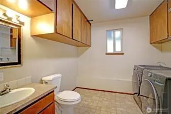 Half bath and laundry downstairs.