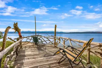 A fun, deck/platform at the water's edge
