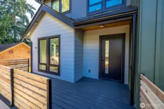 Your gracious front porch welcomes you into this amazing and thoughtful new construction home!  Ample space for some cozy chairs and a table to enjoy your morning coffee overlooking a private wooded, front yard.