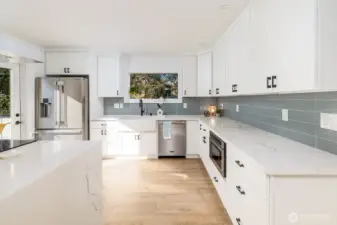 Expansive counters and generous cabinetry elevate both function and style—this home is designed for effortless living.