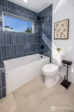 Full tiled shower in Jack and Jill bathroom on second floor.  Heated floors keep you warm and cozy!