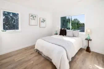 The second of the two top floor bedrooms (excluding the ensuite primary).
