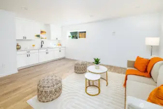The lower level is a showstopper—complete with a generous bonus room, wet bar/second kitchen, bedroom, full bath, and a utility room that blends style with function.