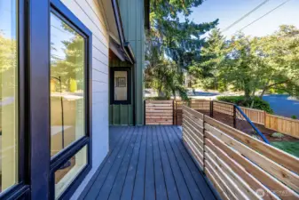 Another view of the front porch deck space.  Very private and serene views and a quiet place to overlook your generous front yard.