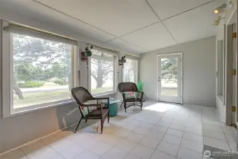 Amazing, bright sunroom - perfect to enjoy on sunny and stormy days