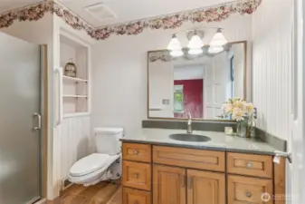 Primary bath with step in shower.