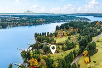 Live the bayside lifestyle and retain the privacy and utility a 5 acre parcel provides.