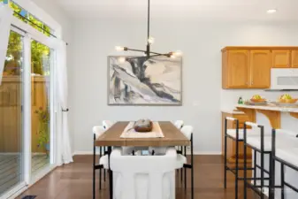 Gather around the heart of the home! The kitchen offers a charming breakfast bar, sleek countertops, and ample cabinet space to inspire your culinary creations.