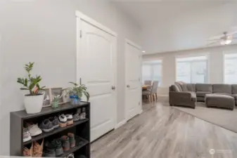 Entryway- garage and storage closet to left, bonus room to right and stairs to right