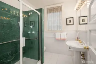 3/4 bathroom on the main floor. Solid stone tile surround.