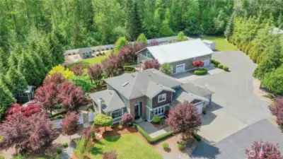 [ONCE IN A LIFETIME OPPORTUNITY] The perfect home comes up and has something for everyone, a true Multi-Generational [UTOPIA], this is the one! This [EPITOME OF EXCELLENCE] is located on 2.42 acres of phenomenal grounds, featuring 3 bedroom, 3 bathroom home, chef inspired kitchen, formal and casual living, primary suite w/ fireplace, covered deck, gardens, gazebos and so much more. HUGE SHOP 40 x 64 plus a 20x18 welding shop, there are living quarters, entertaining quarters (full kitchen, kitchenette, laundry, bathrooms) and even office space. Equipped with car lift and parking for at least 6+ vehicles. ALL IN ONE DREAM ESTATE! Hurry on this one, it really is an amazing home and SHOP. Fruit trees, gardens and so much more.