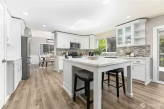 This amazing kitchen is light and bright, featuring sun-filled spaces, sleek finishes, and a layout that perfectly balances style and functionality.