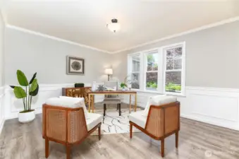 The main floor office or flex space offers versatility, perfect for working from home, a study area, or as a quiet retreat to suit your lifestyle.