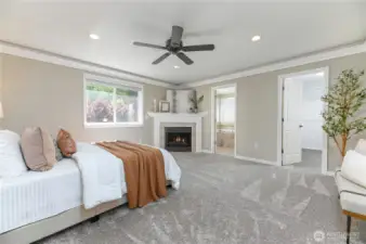 The primary retreat suite is a luxurious sanctuary, offering a serene atmosphere with ample space, a spa-like en-suite bath, and a walk-in closet, providing the perfect escape at the end of the day.