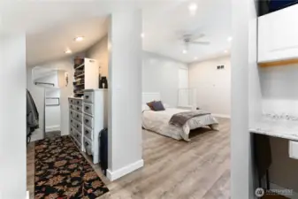 The detached garage/shop features a cozy bedroom, offering the perfect blend of comfort and convenience. Ideal for guests or multi-generational living, it provides a private and relaxing space.