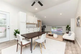 *VIRTUAL STAGE* This large office space, located above the garage, offers the perfect setting for a home office. Dual staircases provide added privacy, separating this room from the main living quarters.