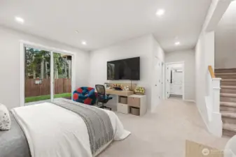 Huge bedroom downstairs with a 3/4 bath and additional storage. Walk out to your patio and yard. Photo's are for representational purposes only. Colors and finishes may differ.