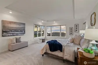 Main floor primary suite with private bath.