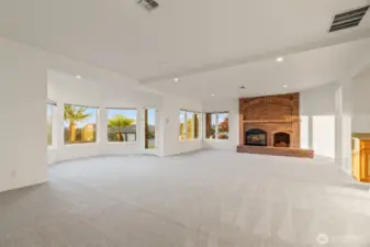 Lower level family room with fireplace.