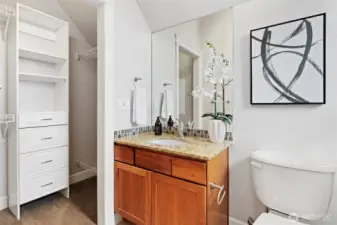 En suite bath for second upper level bedroom.
