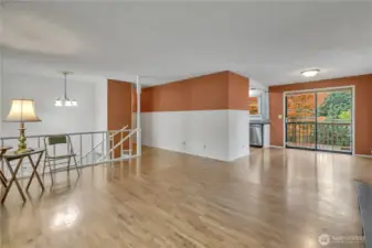 Living room open to the dining room.