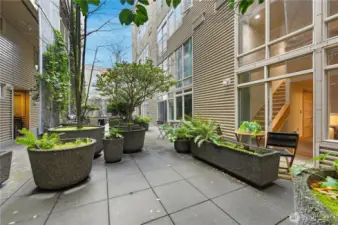 Common area patio but you have your own private space off your home.