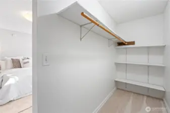 The extended closet space with convenient built-ins.