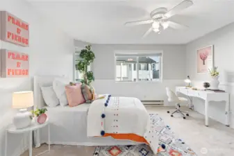 Wake up to morning sunlight in Bedroom #2 with its eastern exposure. Bedroom also updated with new plush carpets and new interior paint.