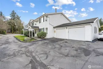 Townhome comes with a rare 1-car detached garage (far right garage) for secured parking and additional storage space. Unit also has a designated parking space next to the detached garage, one of very few townhomes in the community with this bonus reserved parking space!