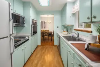 Well-sized kitchen with a functional footprint and natural light, offering a strong opportunity for thoughtful updates and customization.