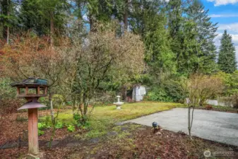 Surrounded by greenery and mature landscaping, creating a sense of calm and privacy.