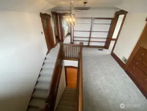 Upstairs landing.  Beautiful woodwork throughout this home.