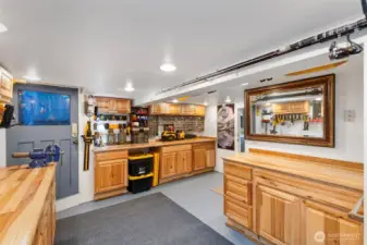 Fully finished basement that workshop area, extra workshop area, storage and utility room.