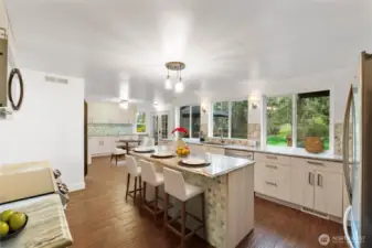 Pull up a stool and dine at the island while overlooking the backyard.