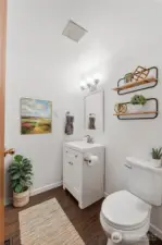 Powder room located down the hall on the main floor.