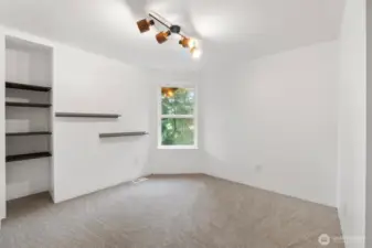 Second of two guest bedrooms located upstairs.