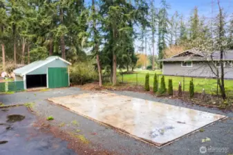 One of the two outbuildings for all of your DIY projects or additional storage. This large monolithic slab is ready for you to construct a shop, covered parking, basketball court or??? The possibilities are endless.