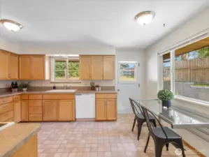 This charming eat-in kitchen offers the perfect blend of function and comfort, with space for a cozy dining table where memories are made over morning pancakes or evening meals.