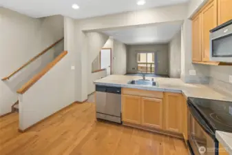 Stairs off the Kitchen to the Bedrooms & Laundry area.